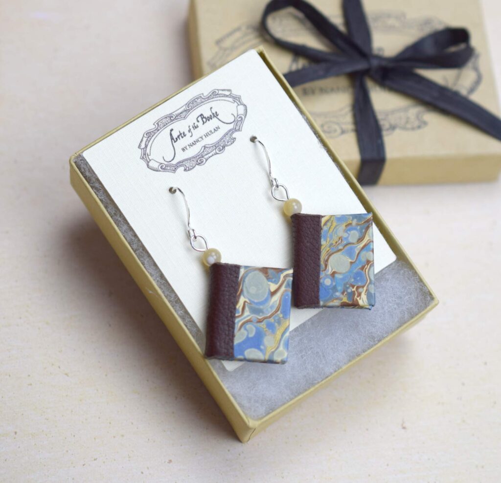 book earrings